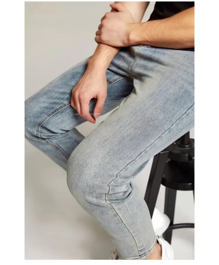 صورة بنطلون جين سليم فيت برجل ضيقة وخصر عالي رمادي