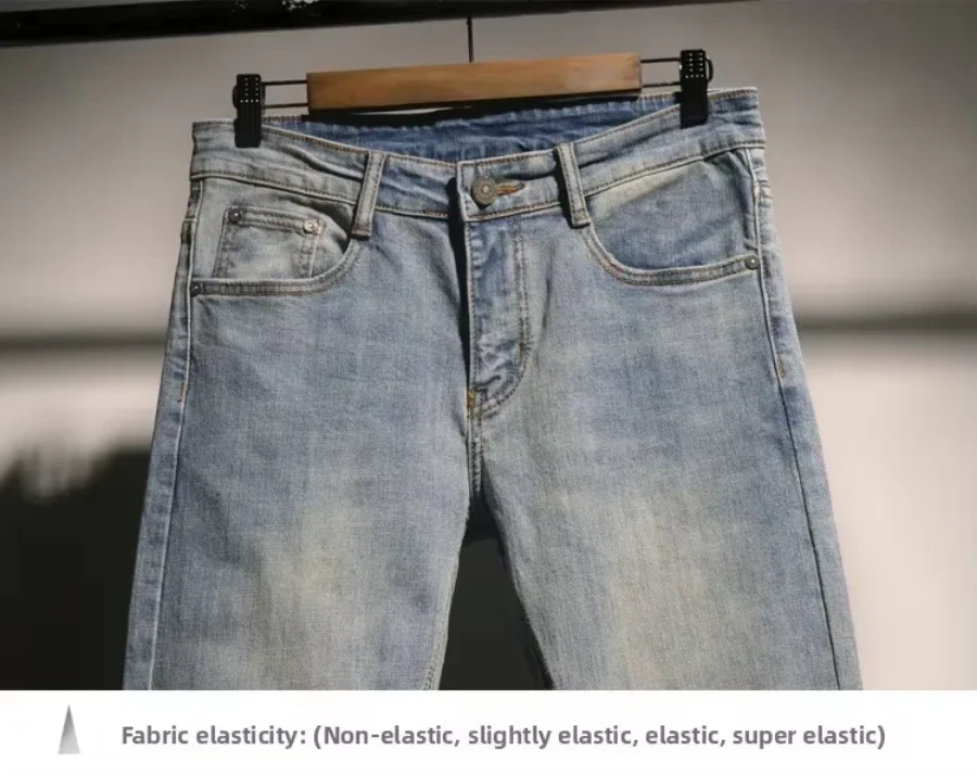 صورة بنطلون جين سليم فيت برجل ضيقة وخصر عالي رمادي