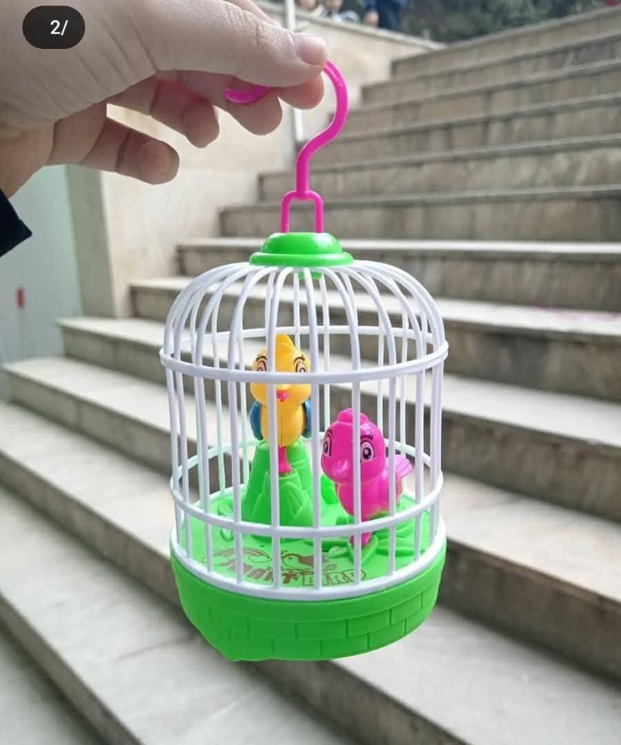 Picture of قفص طيور كهربائي تعليمي بلاستيكي لطيف ومثير للاهتمام مع موسيقى وإضاءة