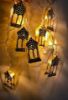 صورة زينة رمضان بإضاءة LED فرع نحاسى على شكل مقامين 