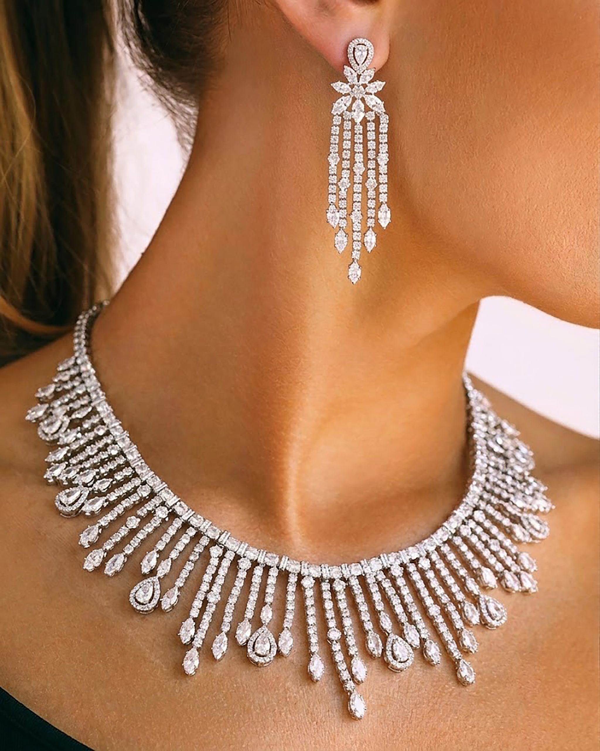 Simulated diamond necklace set with a fringe design.