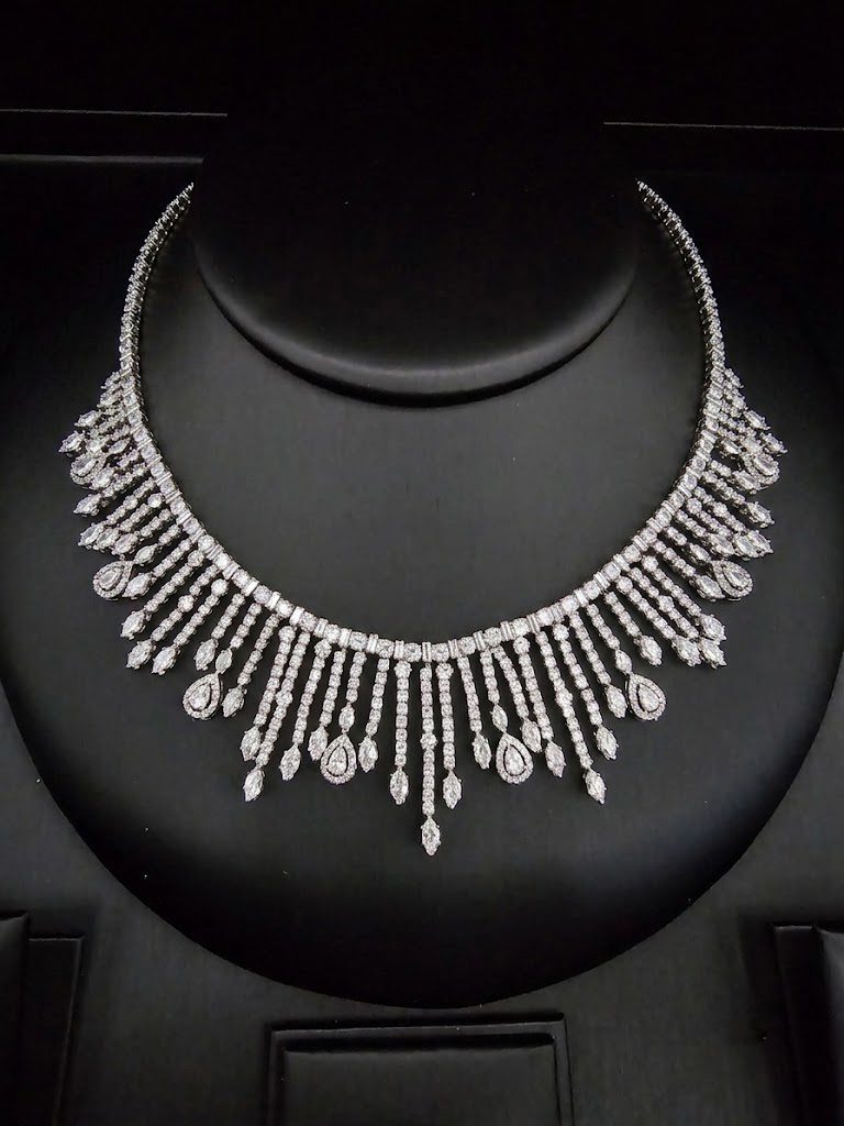 Simulated diamond necklace set with a fringe design.