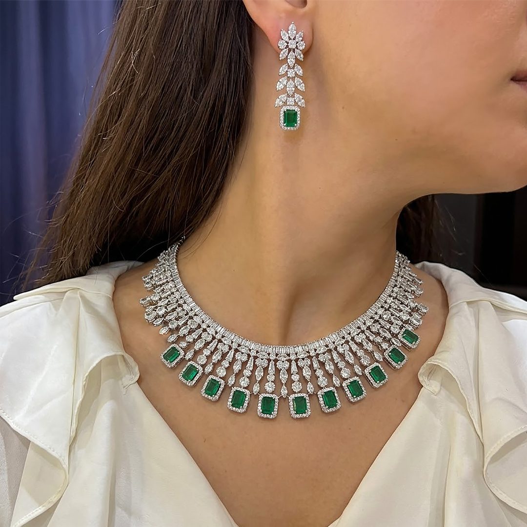 This luxurious set features simulated emeralds and diamonds.